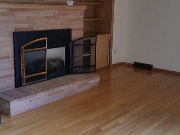 Well cared for hardwood floors on the main floor. built in cabinets, gas fireplace, plenty of natural light.