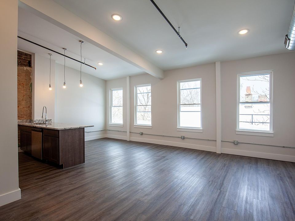 Unit 2 has an elevated first floor view of the courtyard.