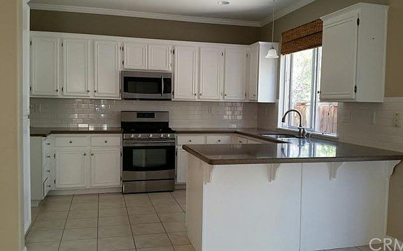 Kitchen with stainless steel appliances