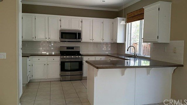 Kitchen with stainless steel appliances