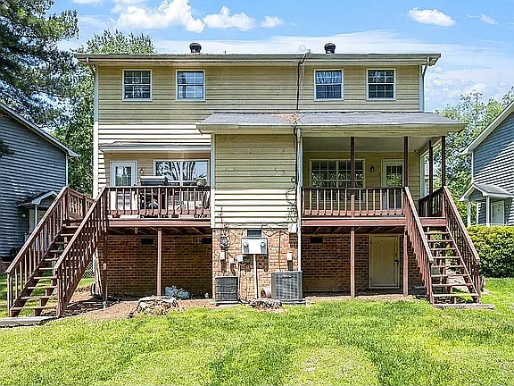 Enjoy outdoor living on your own deck with access to a large fenced yard.