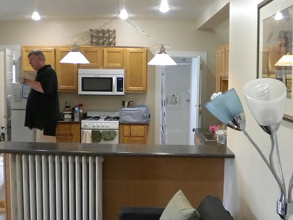 from couch to kitchen, a wide open floorpan
