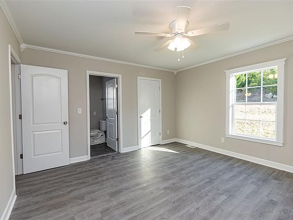 Master bedroom with full bathroom and large closet