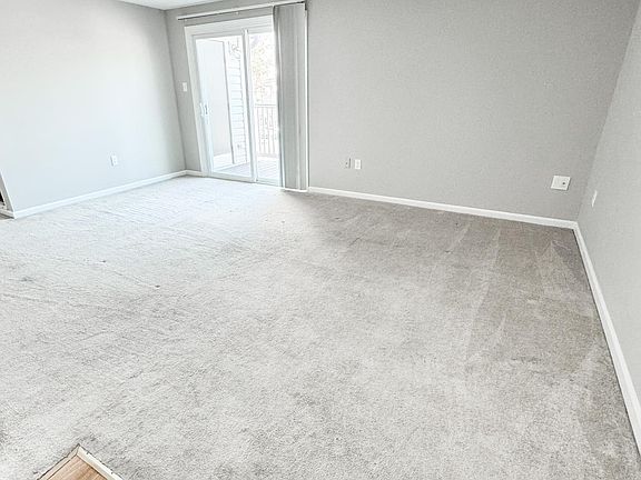 Living Room - Walk in from front door & Goes out to balcony