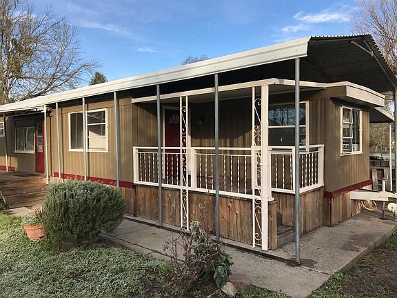 front door entrance with small deck