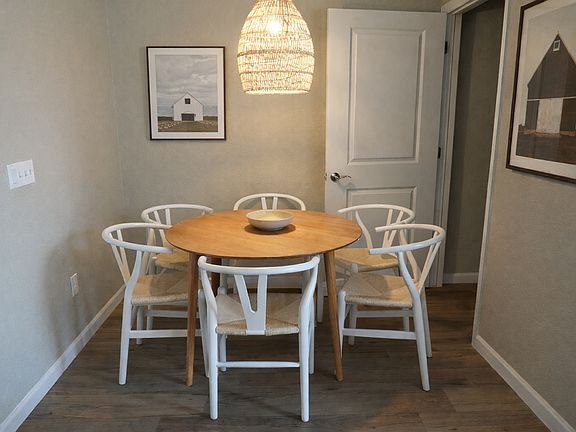 Cozy dining area with main floor bathroom.