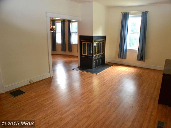 Living Room w/Wood Burning Fireplace