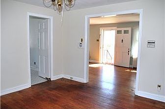 Dining room looking into the kitchen & living rm.