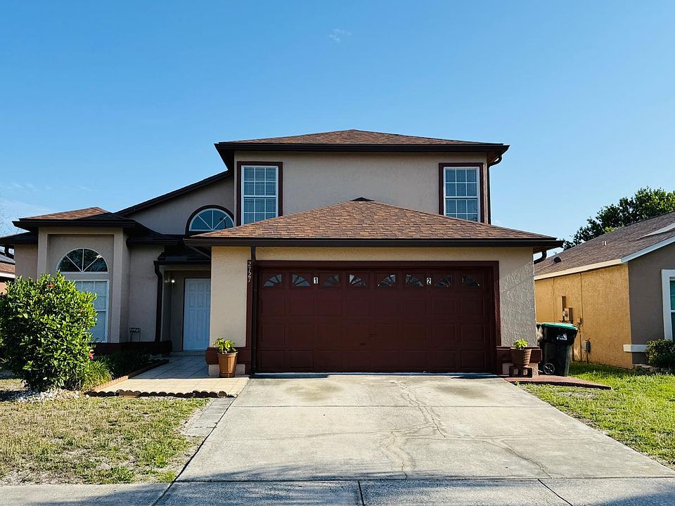 Inviting elevation with private parking space.