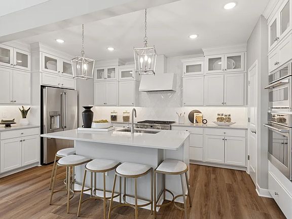 Kitchen with white cabinetry