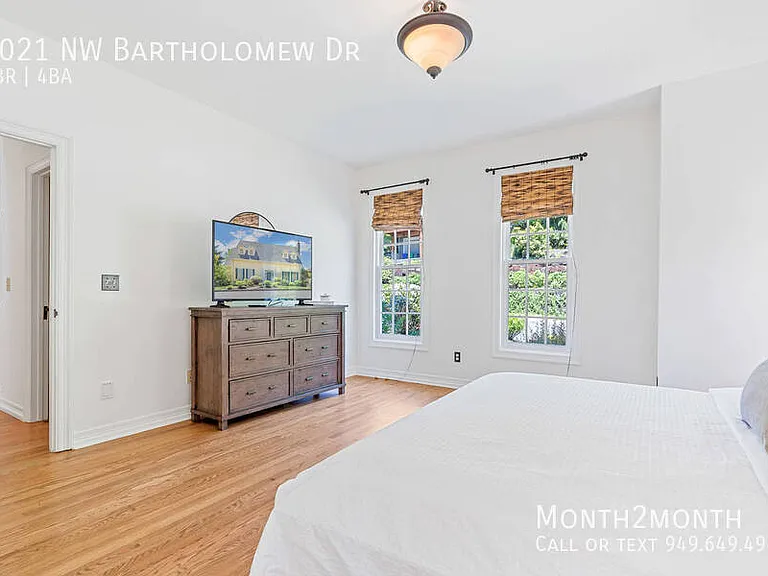 9021 NW Bartholomew Dr — Photo 24
