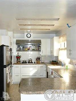 Custom Kitchen.  Nice cabinetry.  Stainless steel appliances.