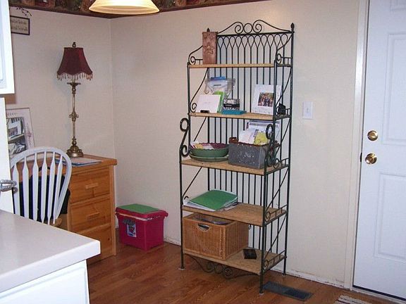 Extra area off kitchen great for an office area.