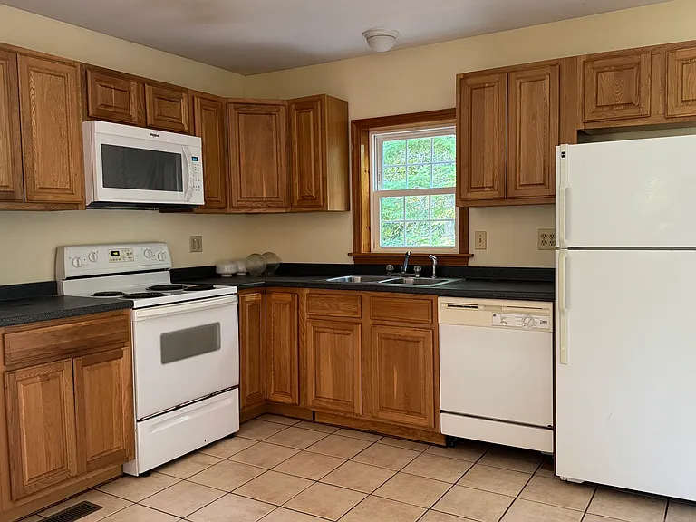 Kitchen: Refrigerator, Dishwasher, Stove and microwave. Kitchen Window Faces Deck