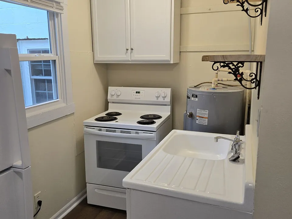 Kitchen, new window, renovated sink rustic shelves new refrigerator new lighting