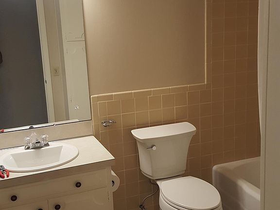 Updated bathroom with luxury vinyl flooring.