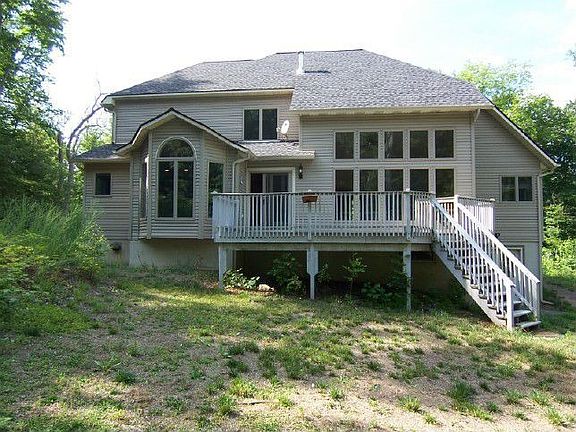 Deck Overlooking 7.58 Acres of Wooded Land
