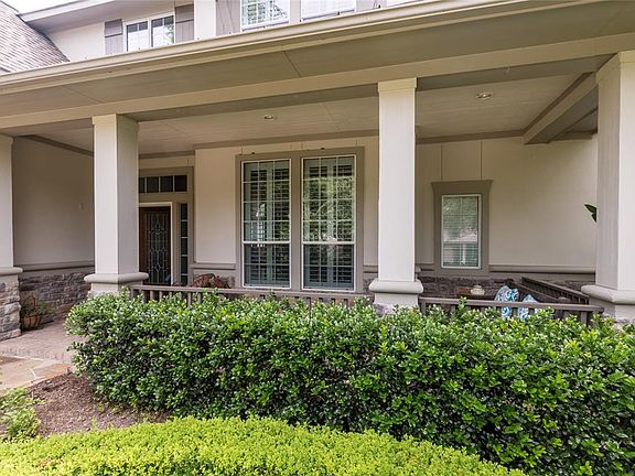 This beautiful home also sports a spacious front porch.
