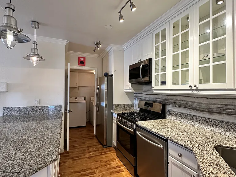 View from entrance to kitchen.