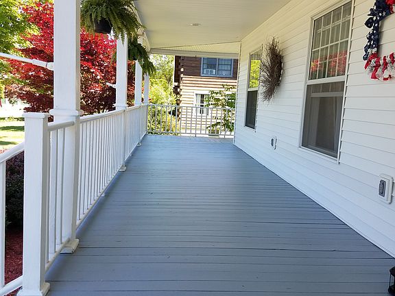 HUGE WRAP AROUND FRONT PORCH