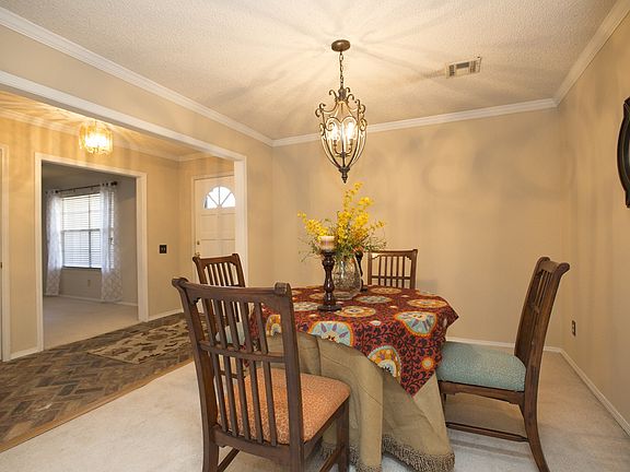 Formal dining with chandelier