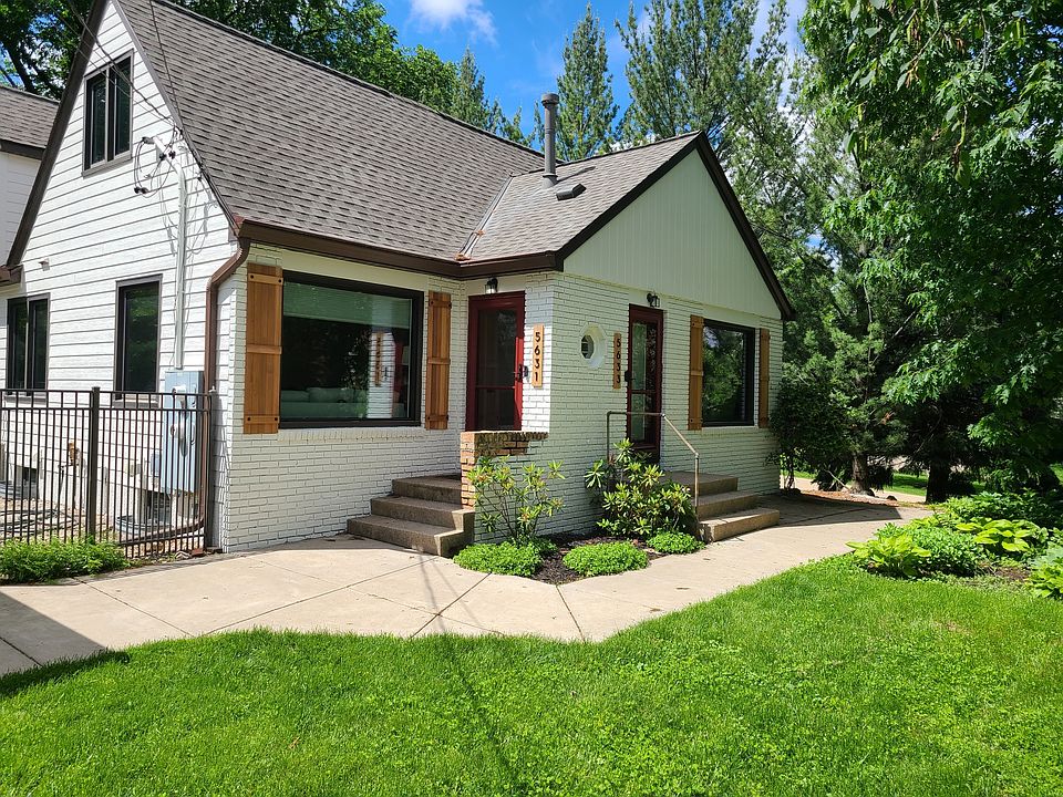 Charming DUPLEX lives like a single-family home