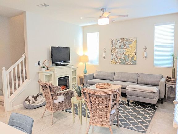 The entire first floor is tile for easy cleanability. Also includes a ceiling fan in the living room.