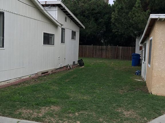 Side yard. Separate storage area right not included