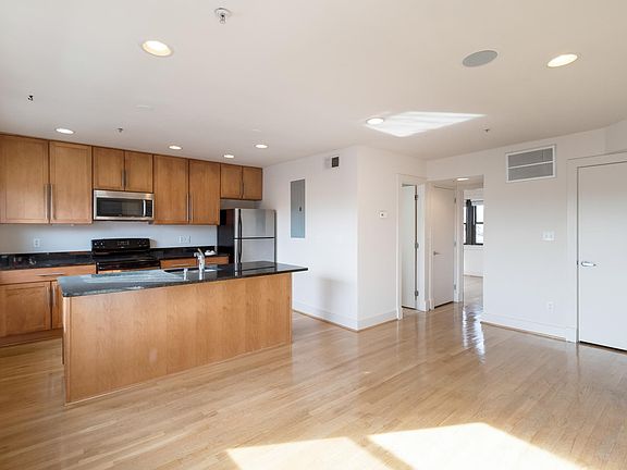 Den and kitchen