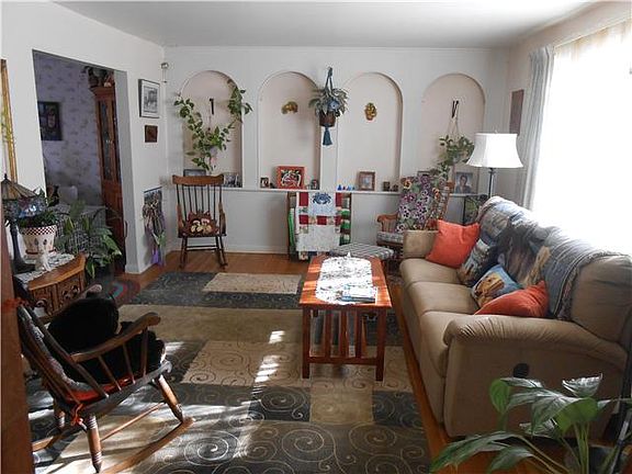 Spacious living room with hardwood floors