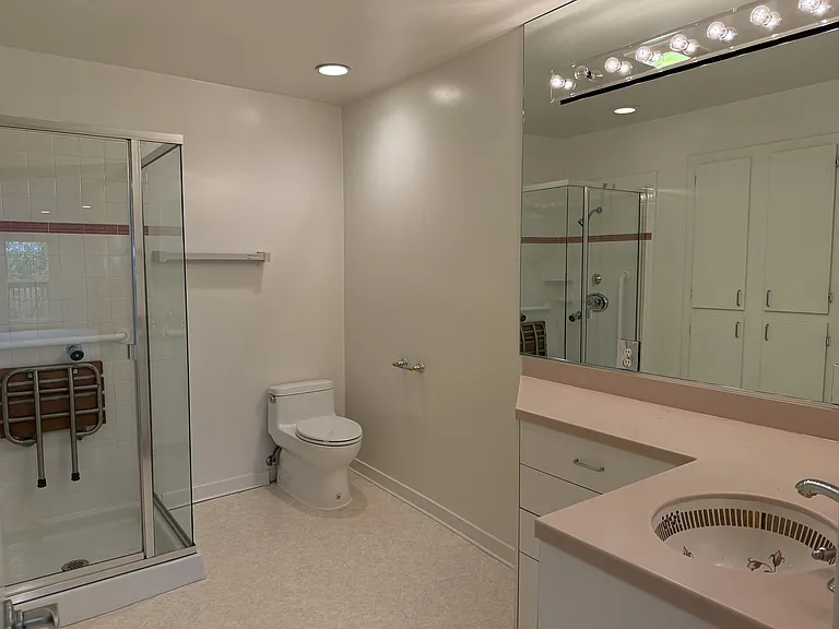 In-suite fifth bathroom.
