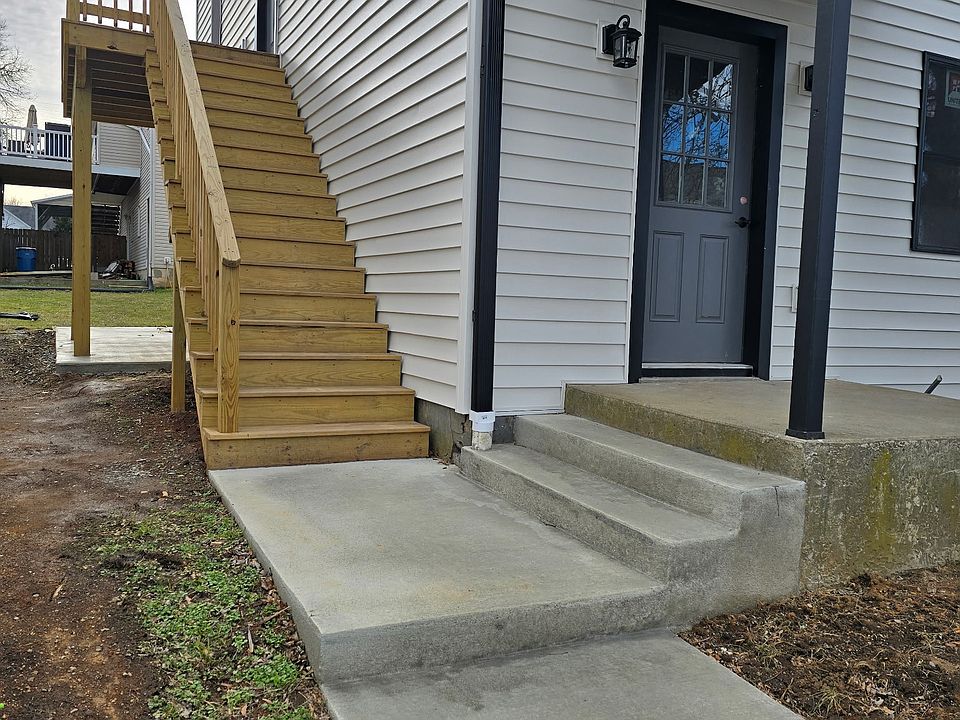 Stairs taking you to the apartment with a private deck