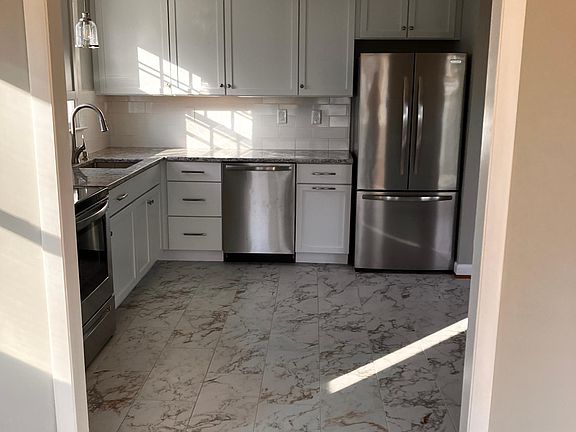 view of kitchen from family/sun room
