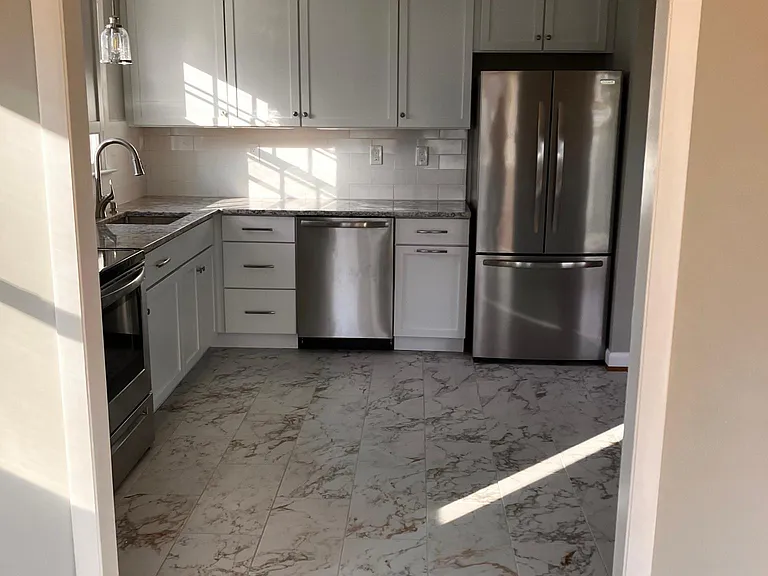 view of kitchen from family/sun room
