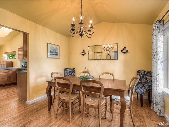 Dining room off Entry and leading to the Kitchen