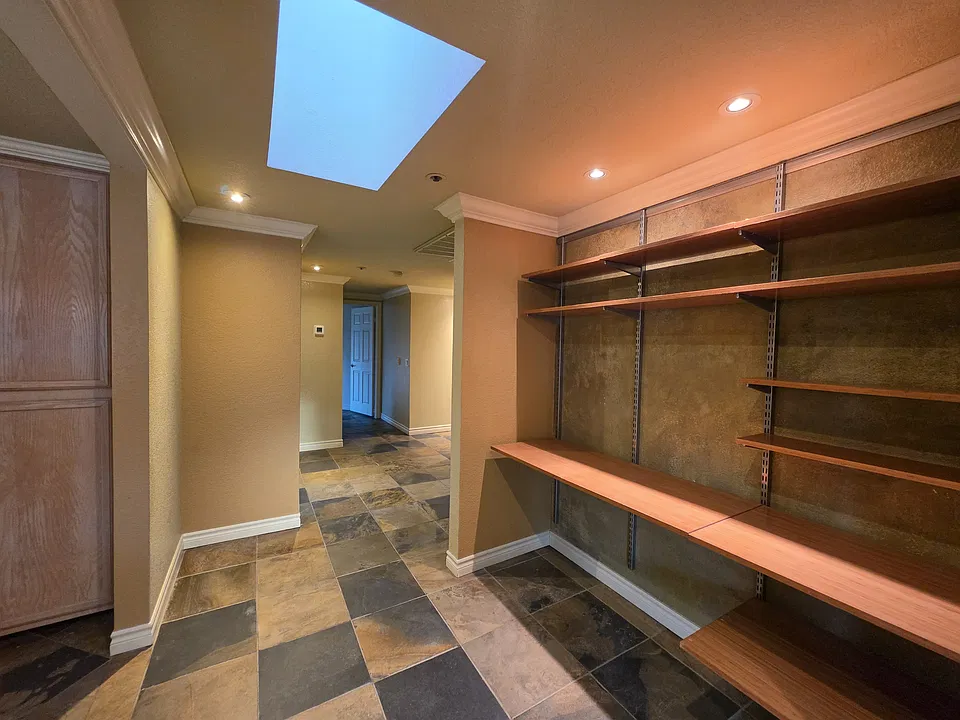 Office and spacious entry.