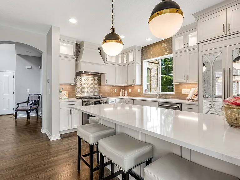 Rich hardwood flooring in Oak throughout.
