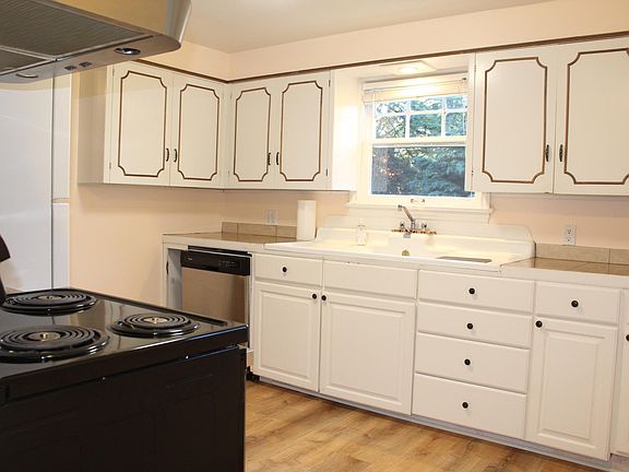 Sun filled kitchen with newer appliances
