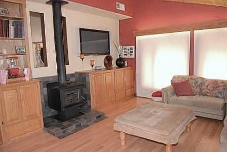 family room with wood burning stove. new slate