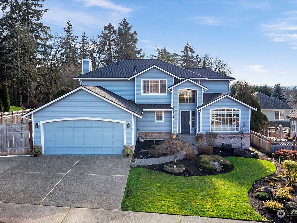 Updated Cobble Creek home features 4 bedrooms + living, 2 dining rooms, family room & xtra finished room with heat for shop/craft room/art studio, office etc>
