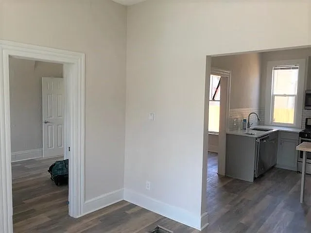 View from Living into bedroom 1 and kitchen
