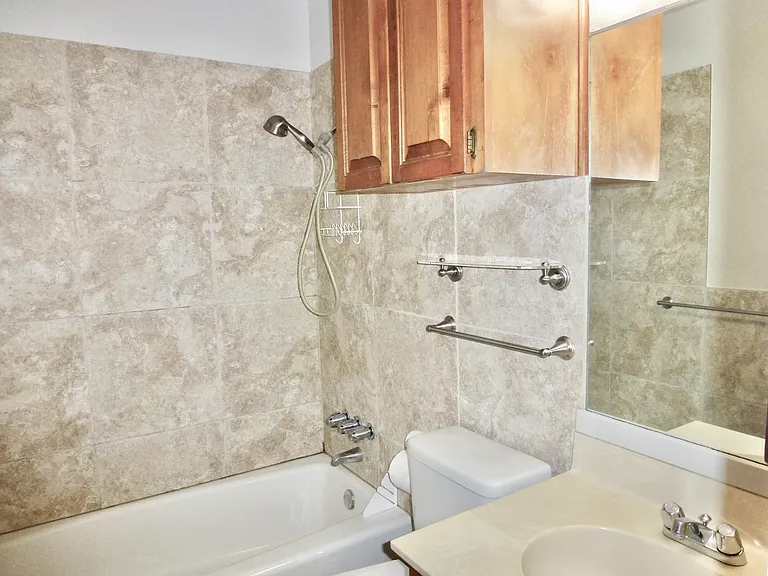 Tub with shower.