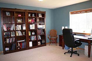 This is one of the upstairs bedrooms being used an an office.