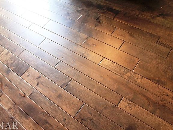 The new wood flooring in the kitchen, front and back halls and powder room is 3 years old!