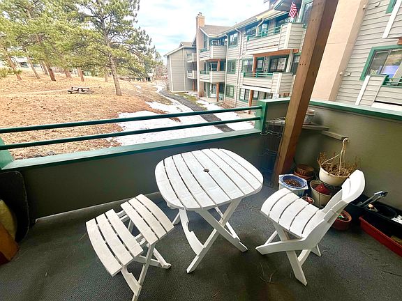 A covered outside balcony connected from the living room.