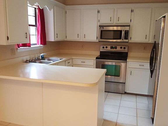 Kitchen Stainless stove and microwave