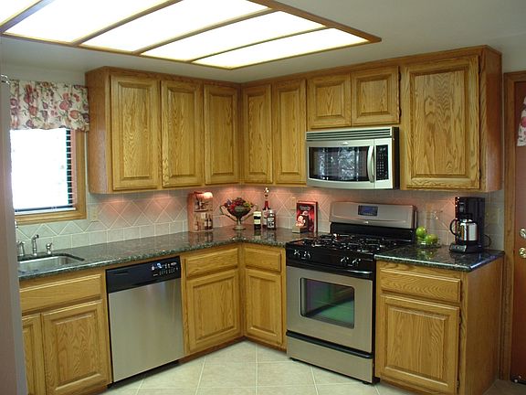 kitchen has new stainless steele appliances