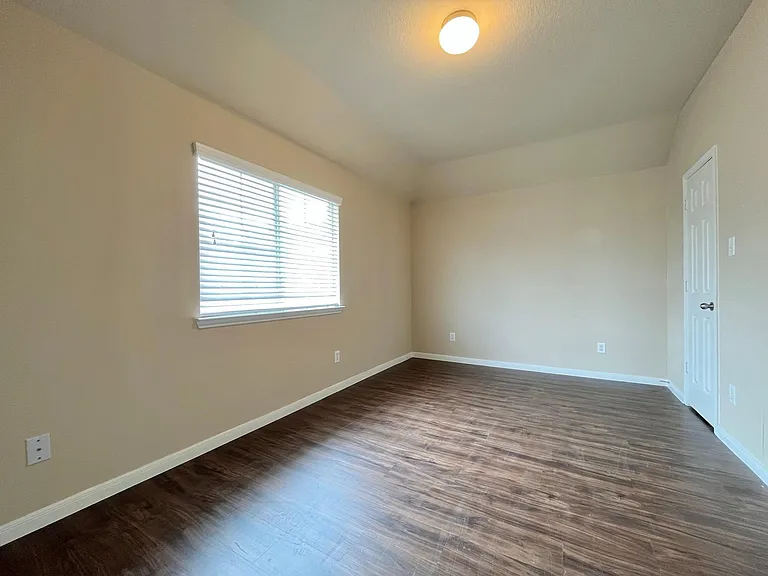 third of the three bedrooms upstairs. big room