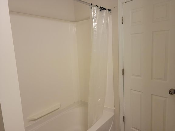 Bathtub in shared bathroom