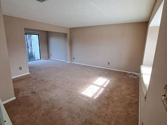 Living room / Dining room combo with half bath